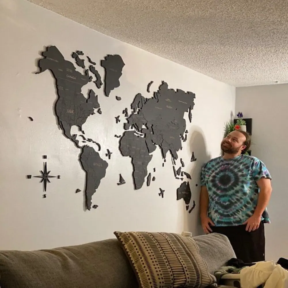 Trip-marked wooden world map