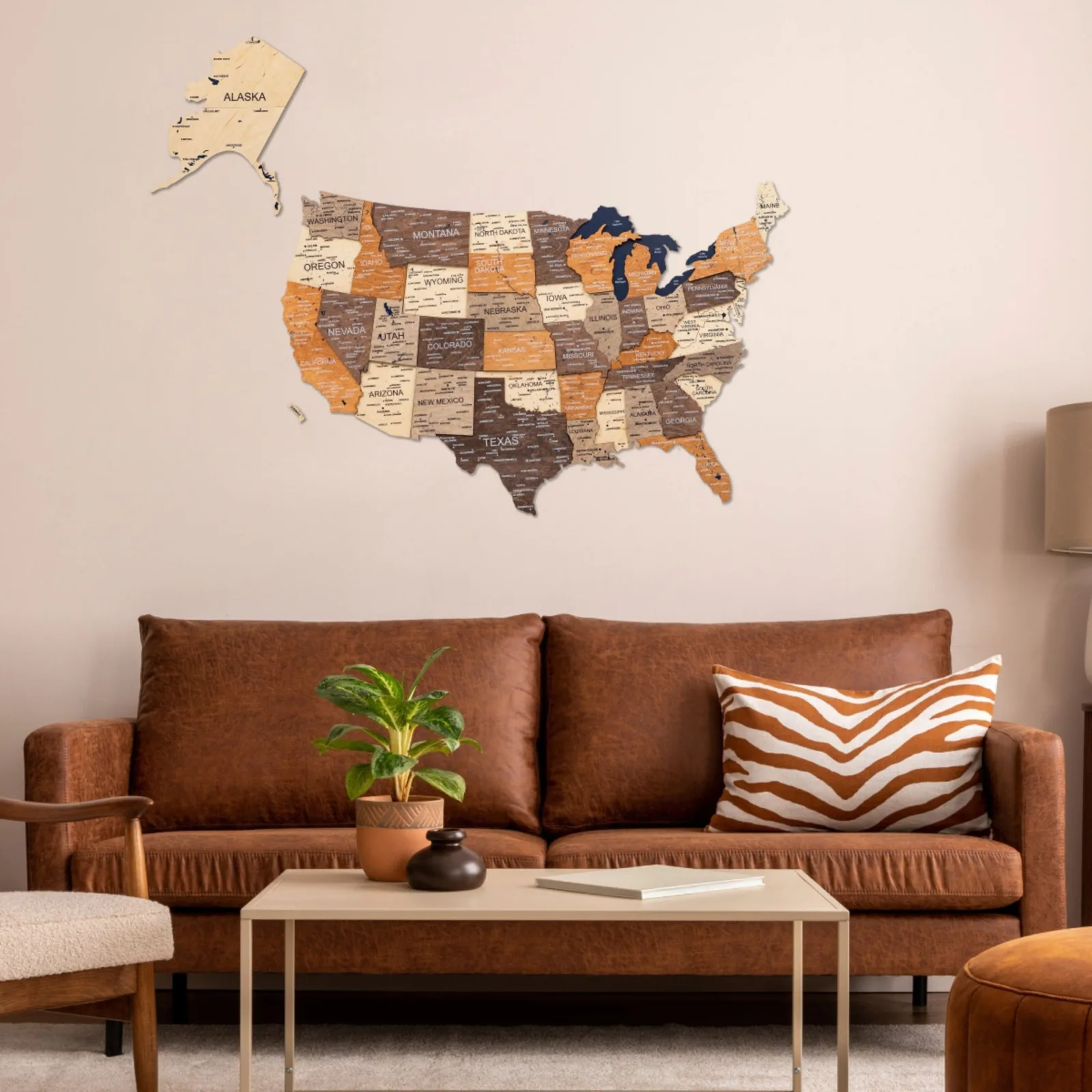 Multicolor 3D wooden USA map above a leather sofa in a living room