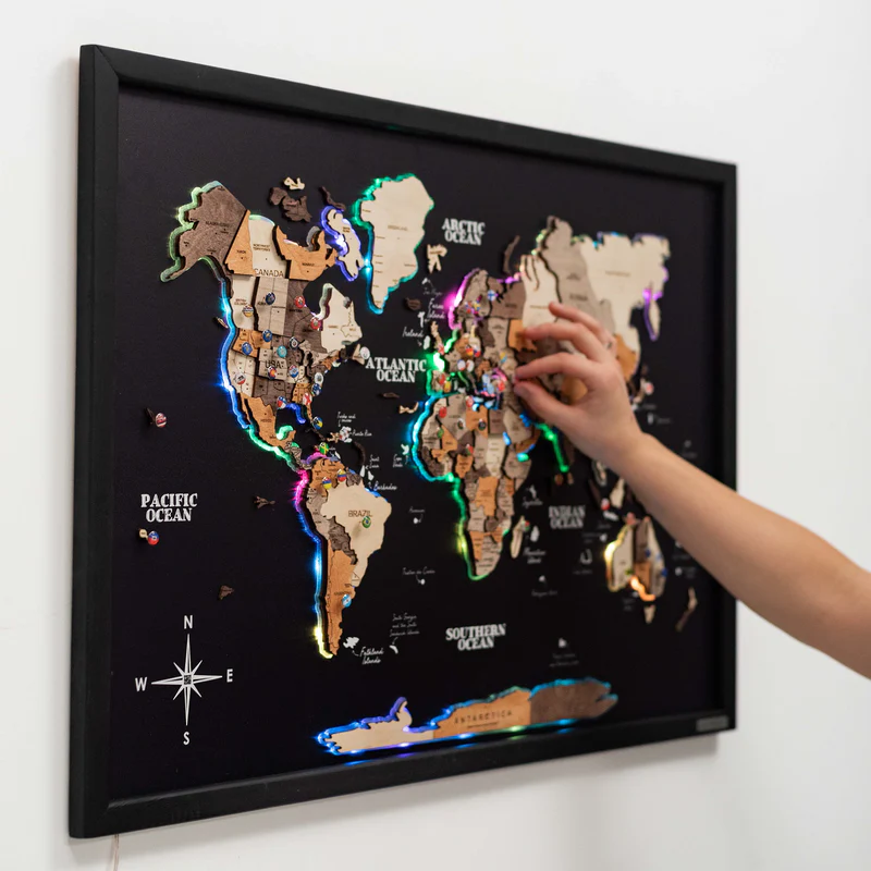 Wooden map with push pin markers